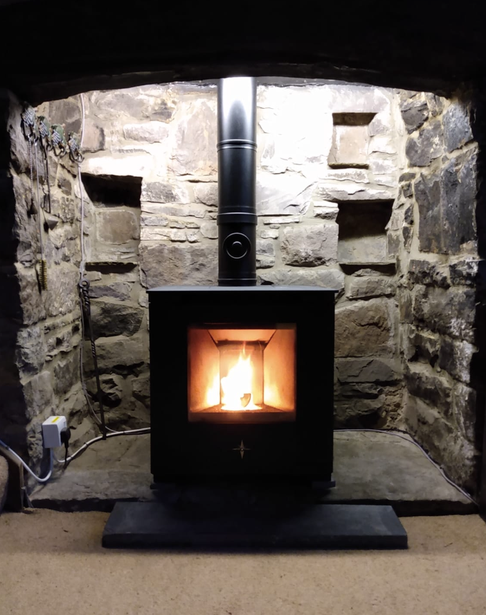 The Lundy 8 pellet fuelled wood burning stove, designed specifically for UK homes