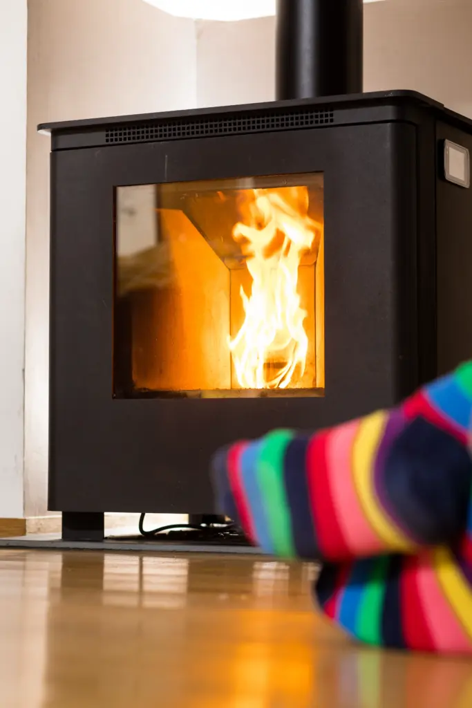 Close-up of a pellet stove flame creating warmth in the home.